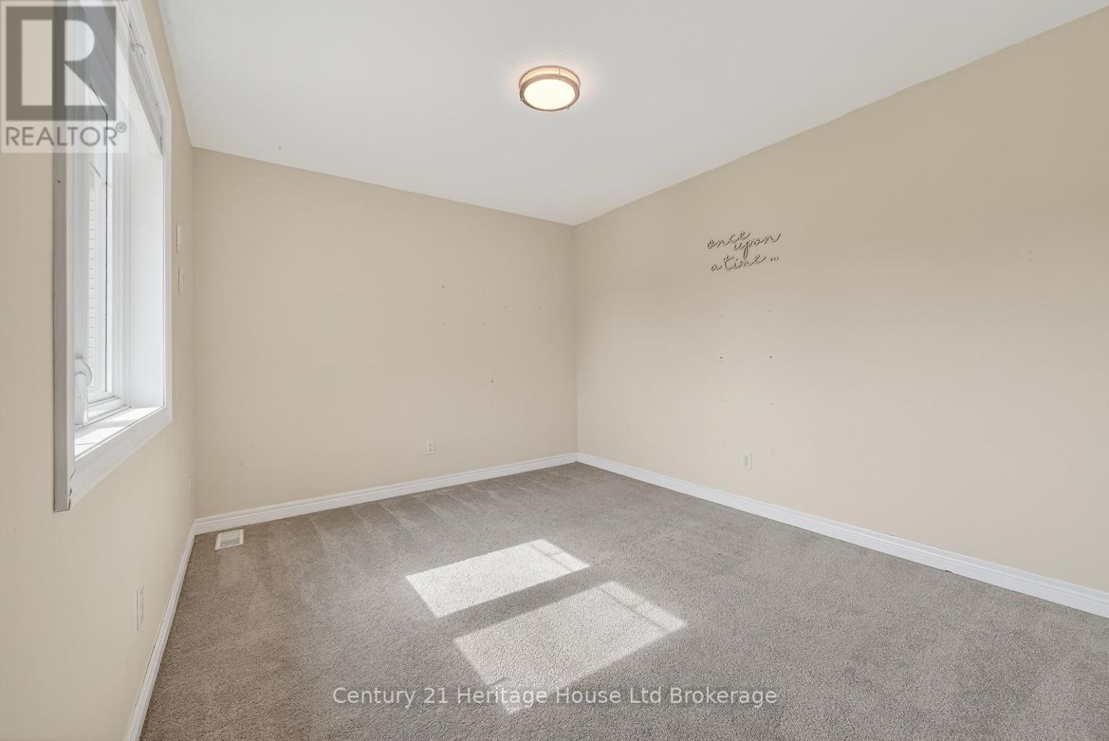 215 Munnoch Boulevard, Woodstock (Woodstock - North), Ontario  N4T 1V7 - Photo 32 - X12926204