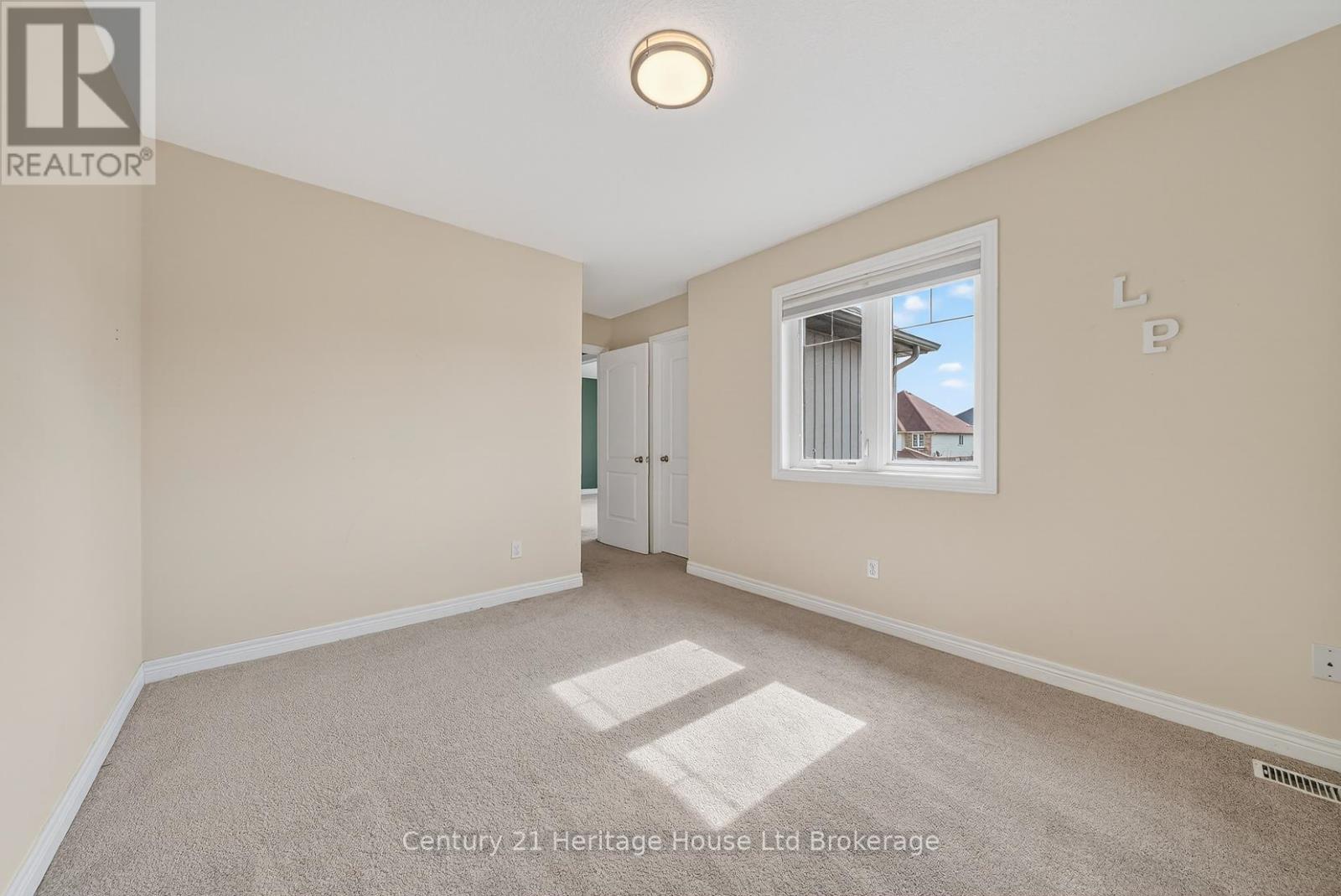 215 Munnoch Boulevard, Woodstock (Woodstock - North), Ontario  N4T 1V7 - Photo 33 - X12926204