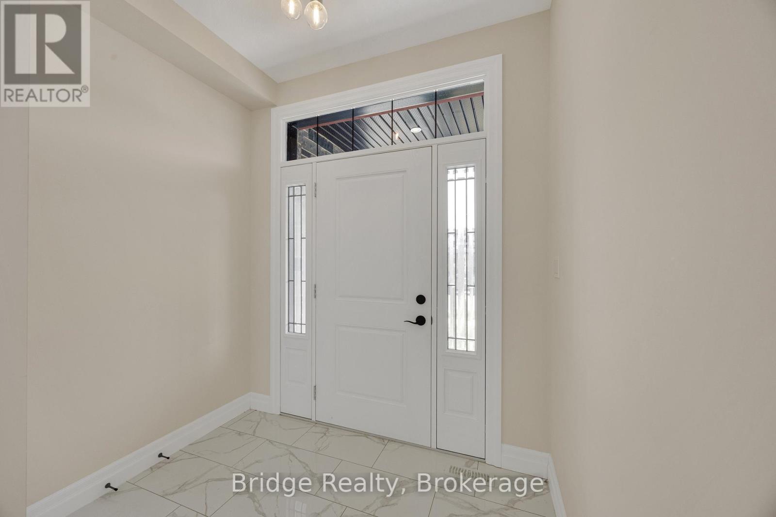 256 Tamarack Boulevard, Woodstock (Woodstock - North), Ontario  N4S 0E2 - Photo 4 - X12946980